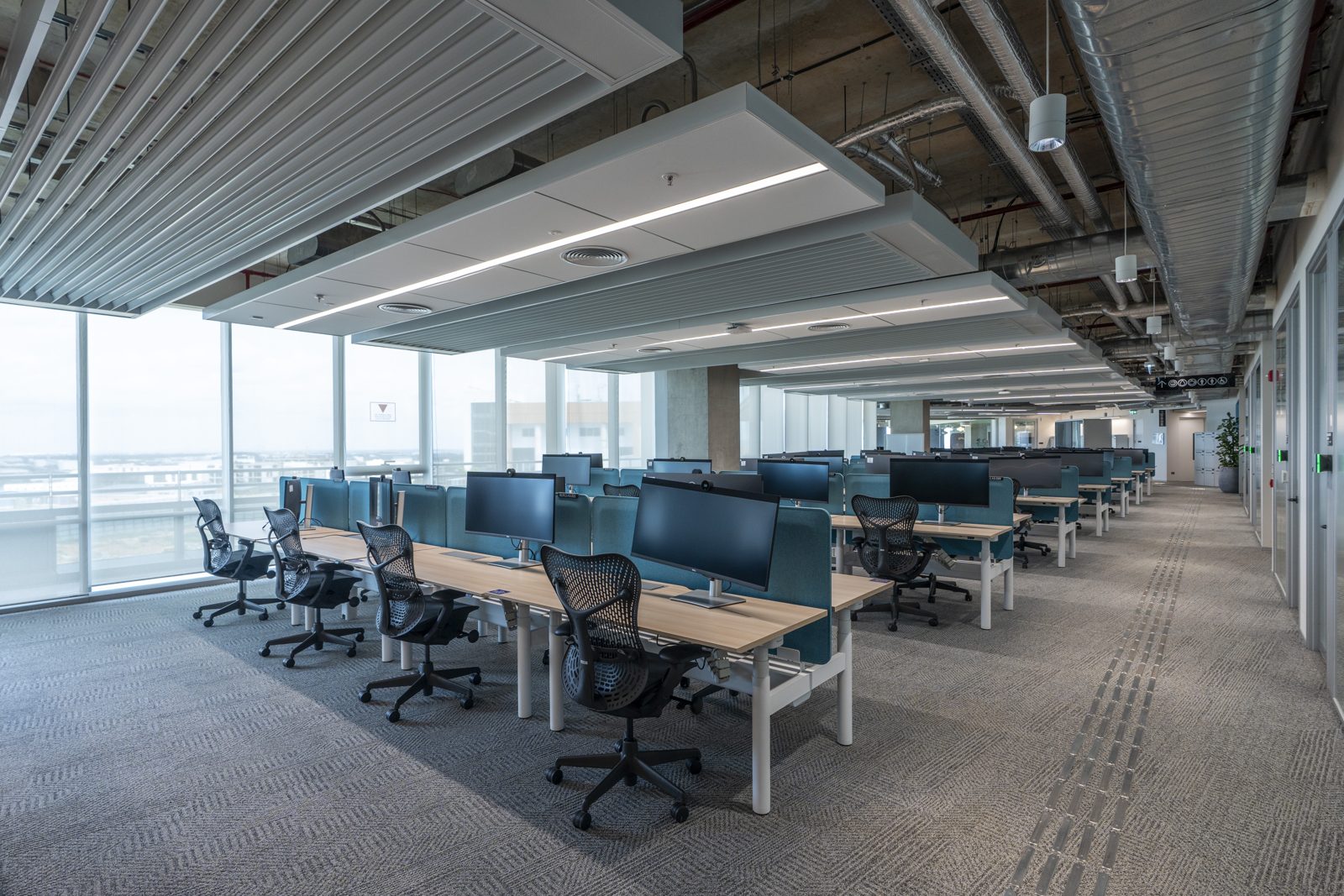 SAP โ engineered ceiling installation by Unicorn